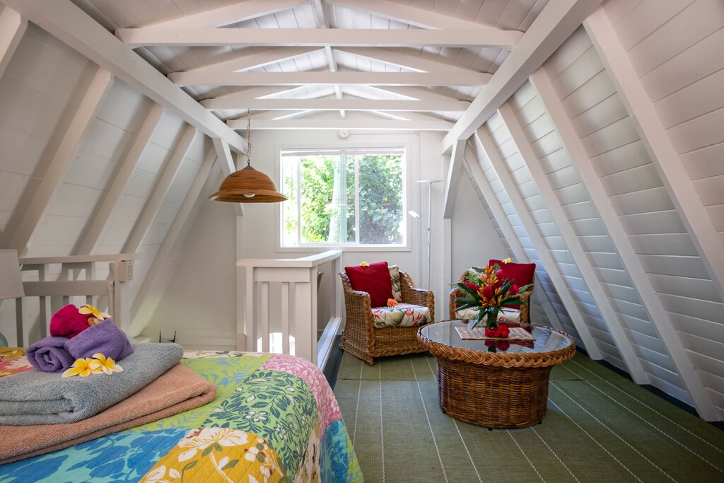 Image of a white loft bedroom in Hawaii