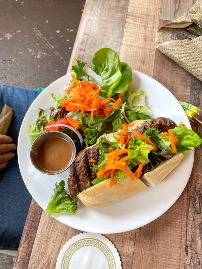 Image of a burger on a baguette at Uahi Island Grill in Kailua Oahu