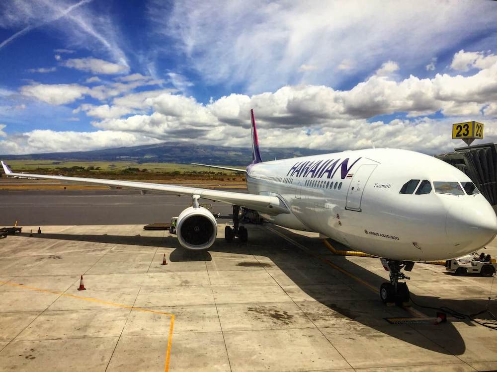 Image of a Hawaiian Airlines plane at Kahului Airport on Maui