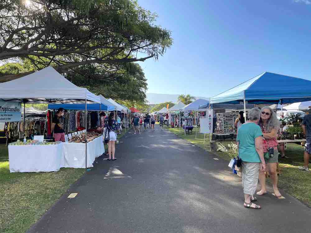 Image of pop up tents with Hawaii vendors at the Maui Swap Meet in Kahului