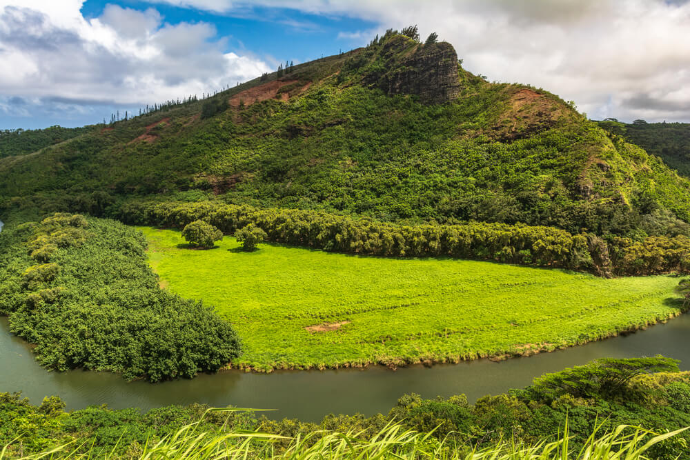 Image of the Wailua River and green mountains on Kauai