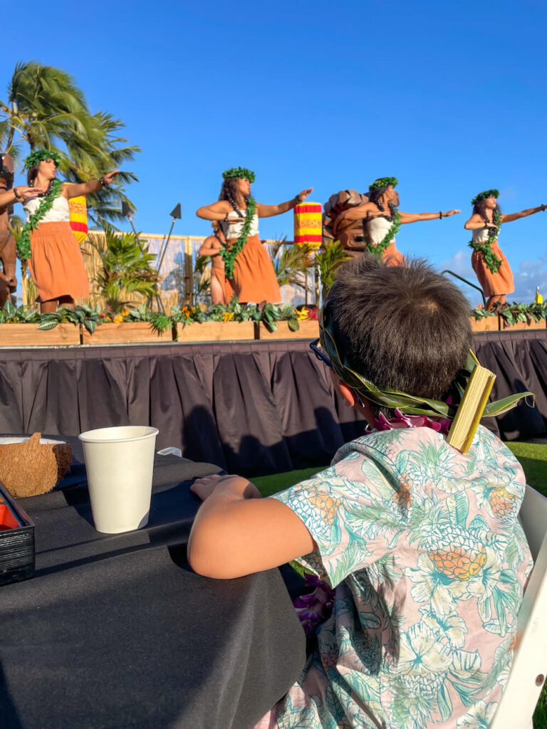Aulii Luau on Kauai: Image of a boy in the front row of a luau