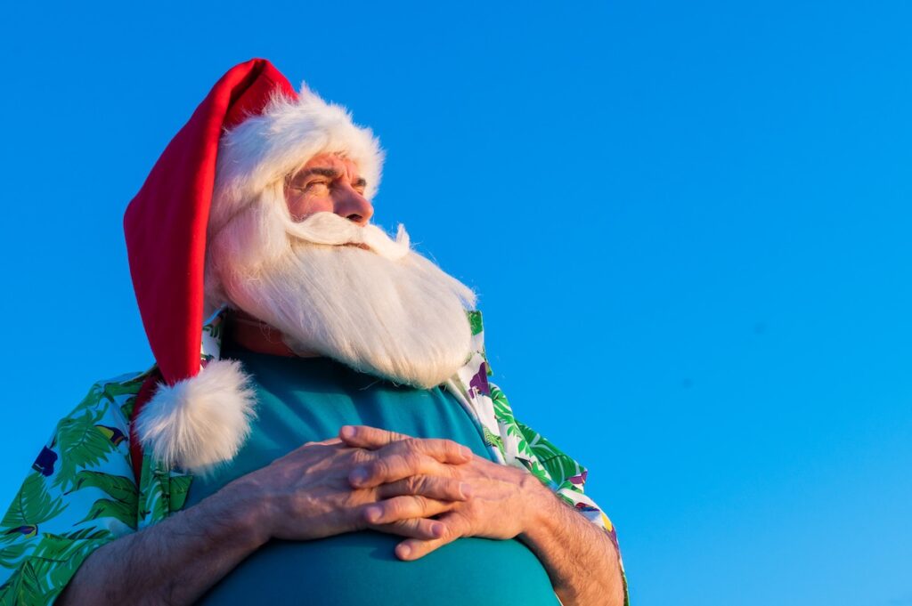 Find out where to see Santa Claus in Hawaii recommended by top Hawaii blog Hawaii Travel with Kids! Image of Santa in Hawaii