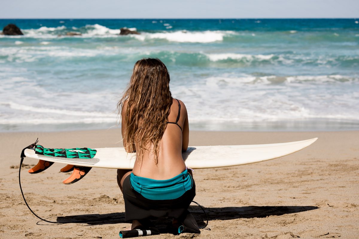 Find out the best things to do on Maui in June recommended by top Hawaii blog Hawaii Travel Spot! Image of surfergirl is wating for the perfect wave