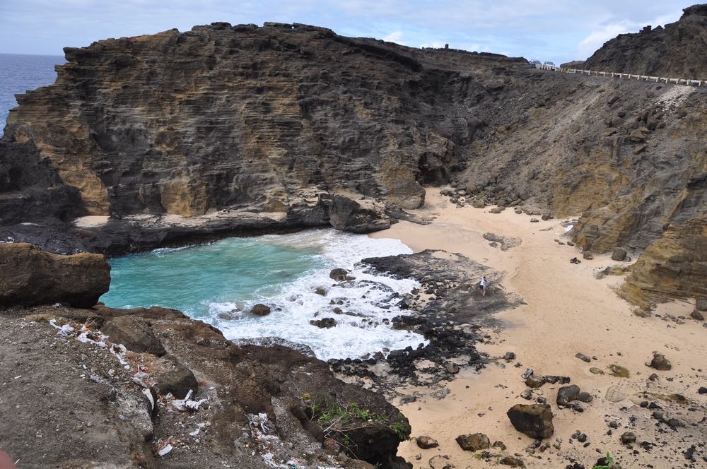 Image of a beach on a cove on Oahu