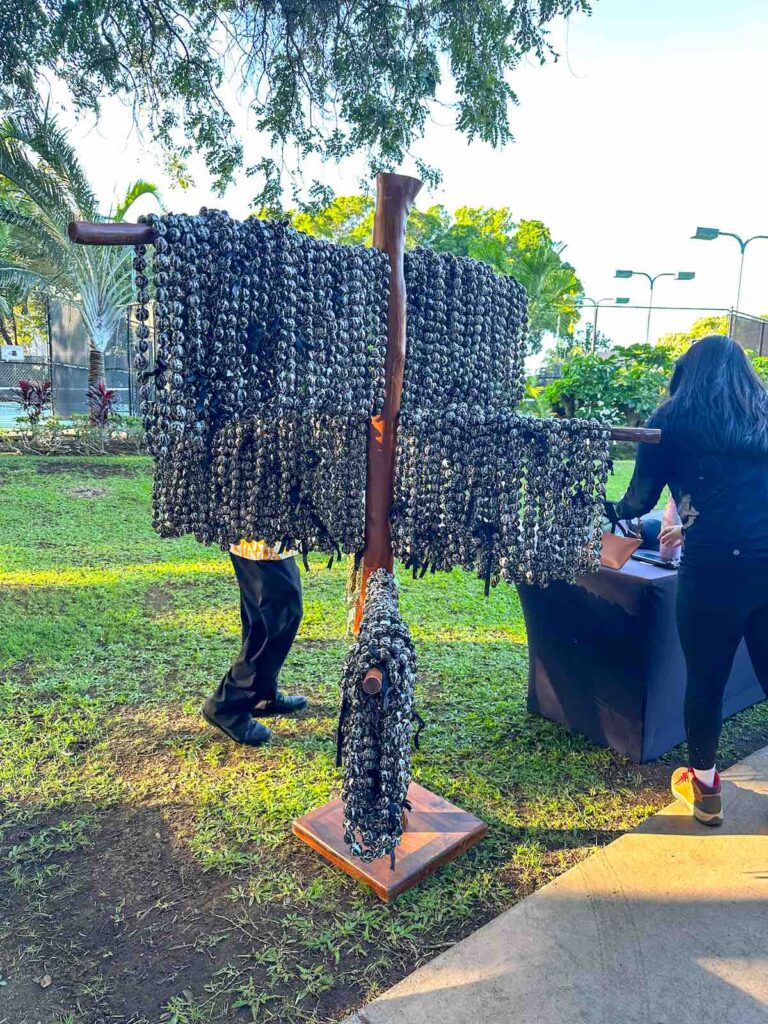 Image of a stand filled with kukui nut leis at the Fairmont Orchid Luau