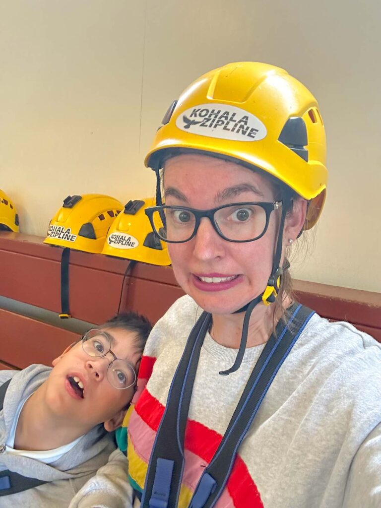 Selfie of a mom and boy getting ready to go ziplining in Hawaii