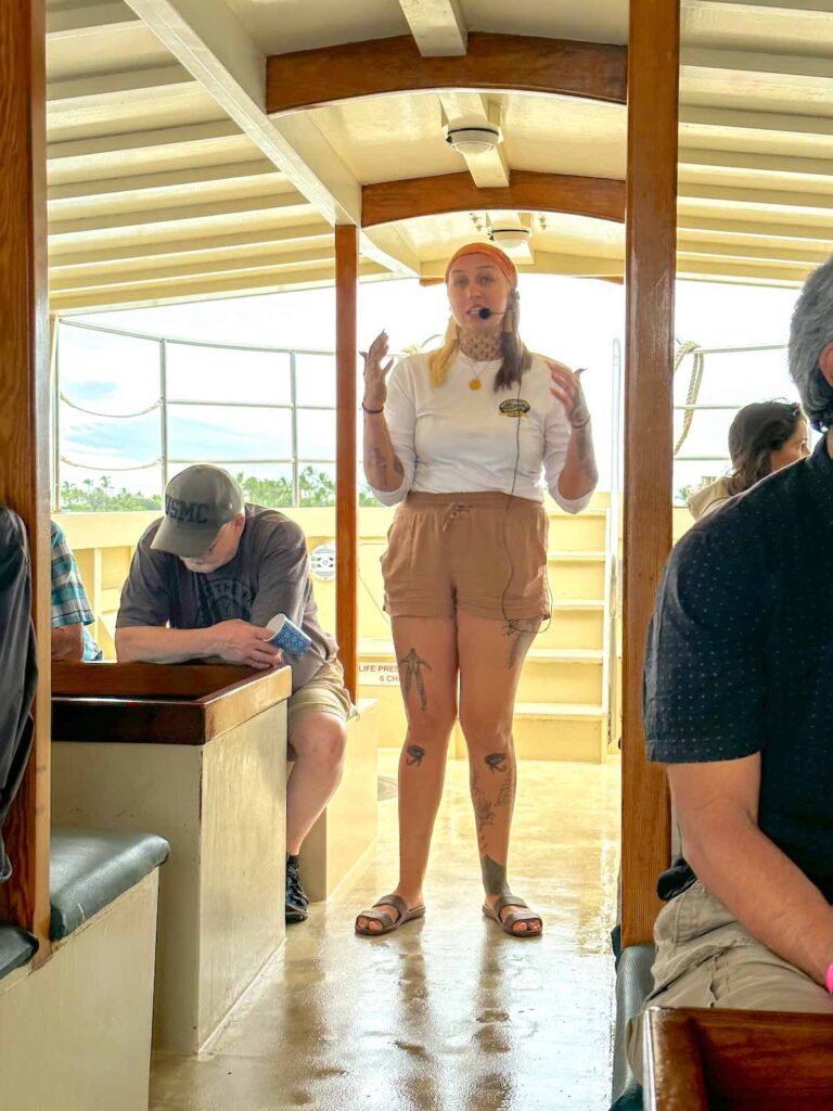 Image of a tour guide on the Kona Glassbottom Boat.