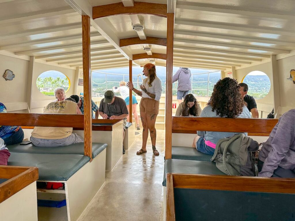 Image of a tour guide on the Kona Glassbottom Boat Tour.