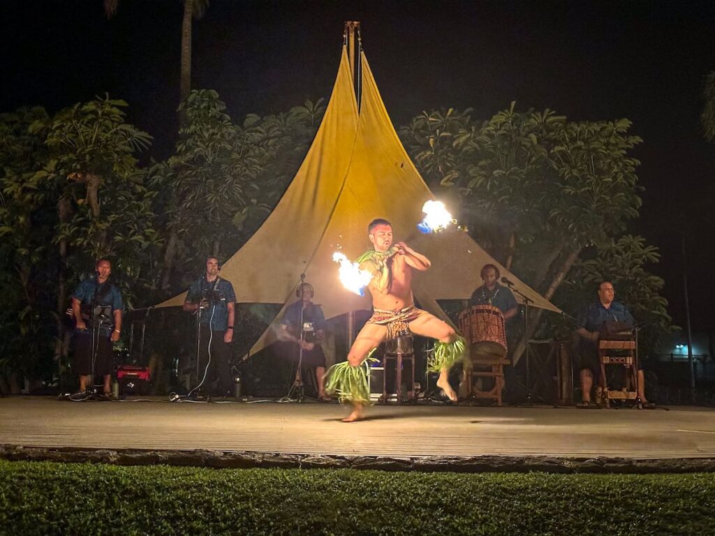 Image of a man performing a Samoan Fire Knife dance at the Fairmont Orchid Luau on the Big Island