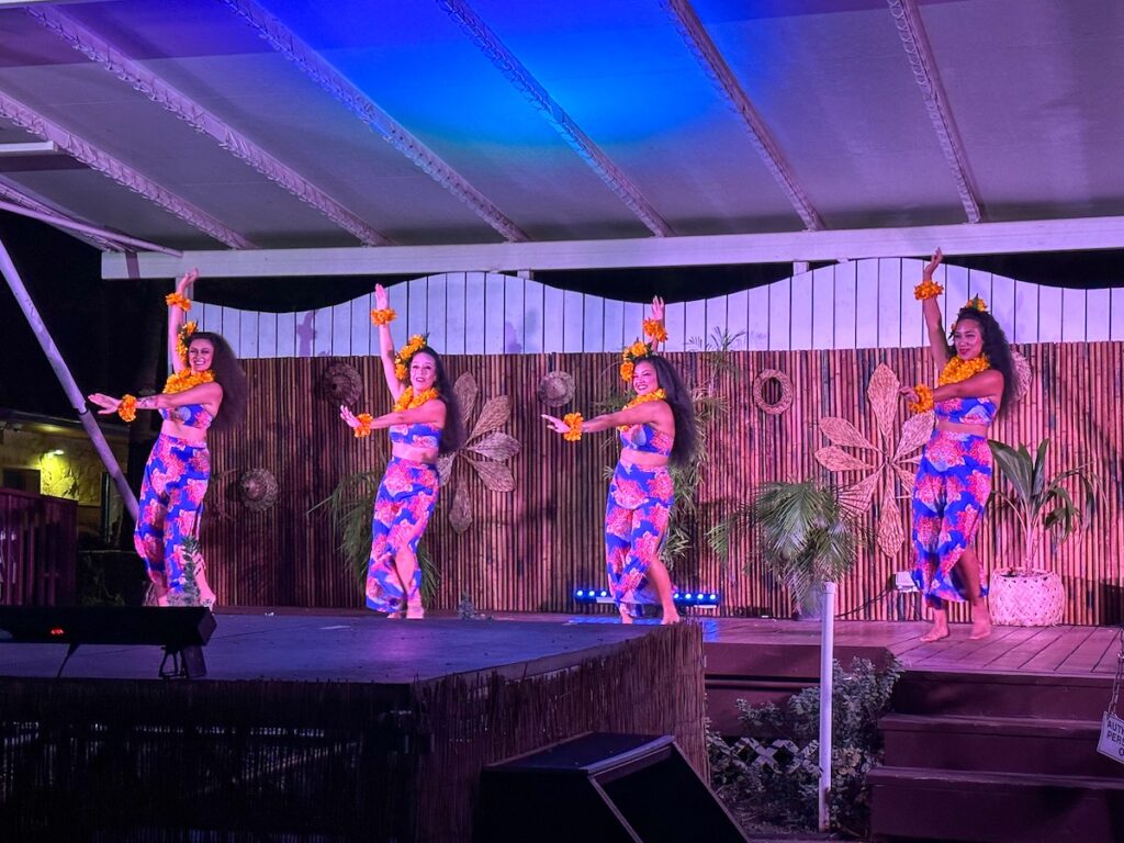 Image of hula dancers at the Diamond Head Luau on Oahu. Photo credit: Marcie Cheung