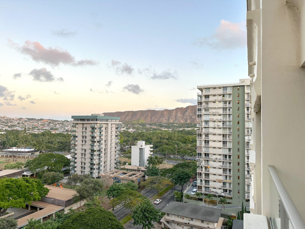 Image of Diamond Head and hotel buildings from a room at the Hyatt Place Waikiki Beach. Photo credit: Marcie Cheung of Hawaii Travel with Kids