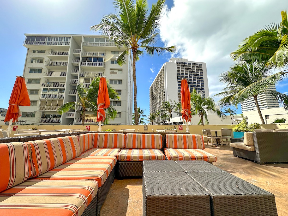 Check out this honest Hyatt Place Waikiki Beach review by top Hawaii blog Hawaii Travel with Kids. Image of the rooftop courtyard at Hyatt Place Waikiki Beach