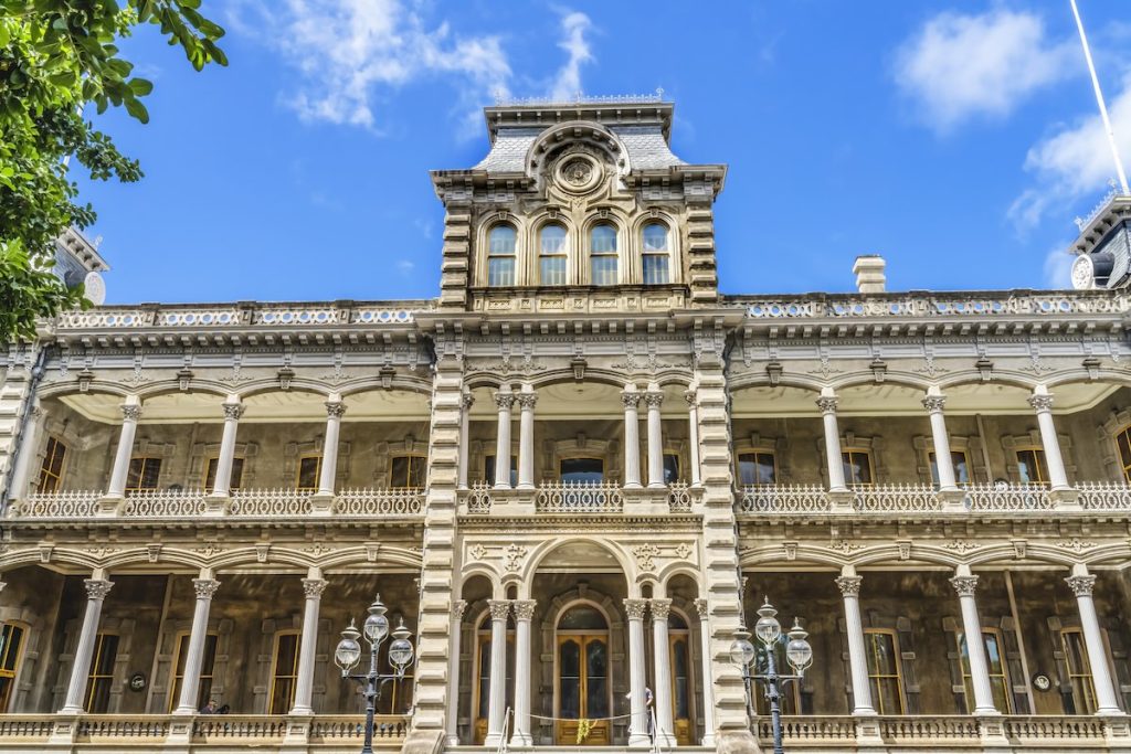 Find out the coolest Hawaii landmarks worth seeing with tips from top Hawaii blog Hawaii Travel with Kids! Image of Iolani Palace