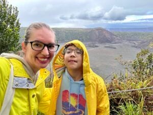 Image of Marcie Cheung and her son at Hawaii Volcanoes National PArk.