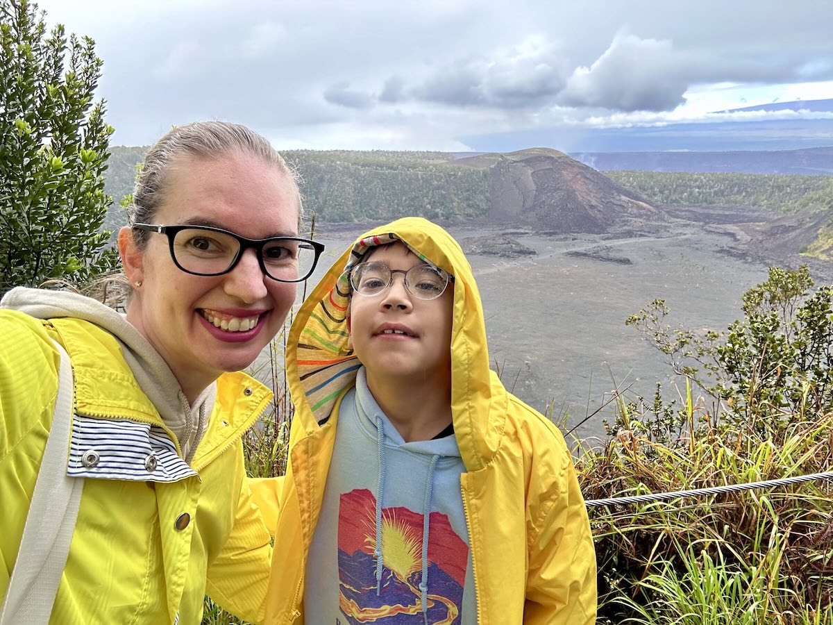 Image of Marcie Cheung and her son at Hawaii Volcanoes National PArk.