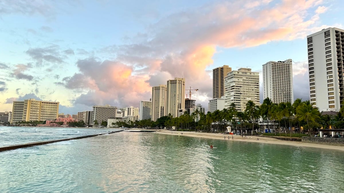 Find out what's going on with Hawaii vacation rentals in 2026. Image of Waikiki at sunrise.